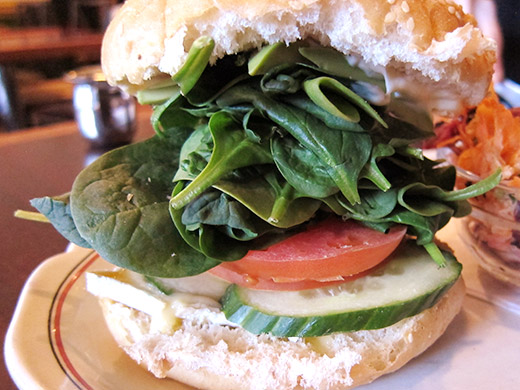 Perch's Brie Melt ($10) stacked with brie, avocado, cucumber, tomato, spinach, mayo on a kaiser bun.