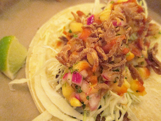Pork Jowl Taco ($6): Tender pork jowl with cripsy cracquelins, cabbage, fried shallot, pineapple and a hit of Sriracha.