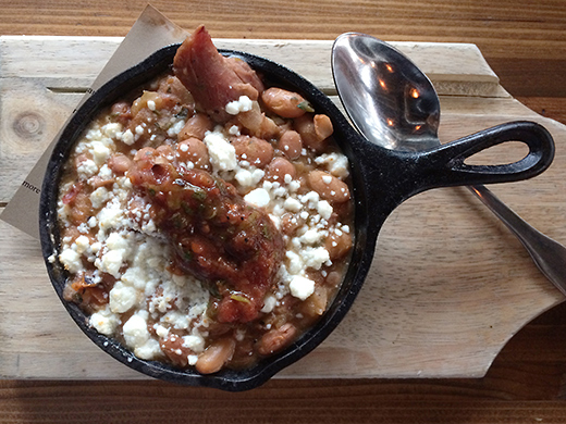 Cowboy Baked Beans ($5): with cotija cheese & salsa. 