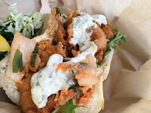 Oyster Poâ€™boy ($8.10): Sawmill Bay Oysters, arugula, spicy cabbage, chive and dill sauce.